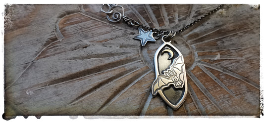 Silver and gold bat pendant